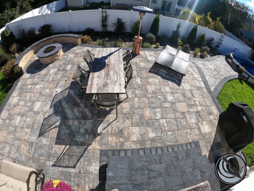 cambridge pavingstone patio, outdoor stone fire pit, outdoor living hardscape design