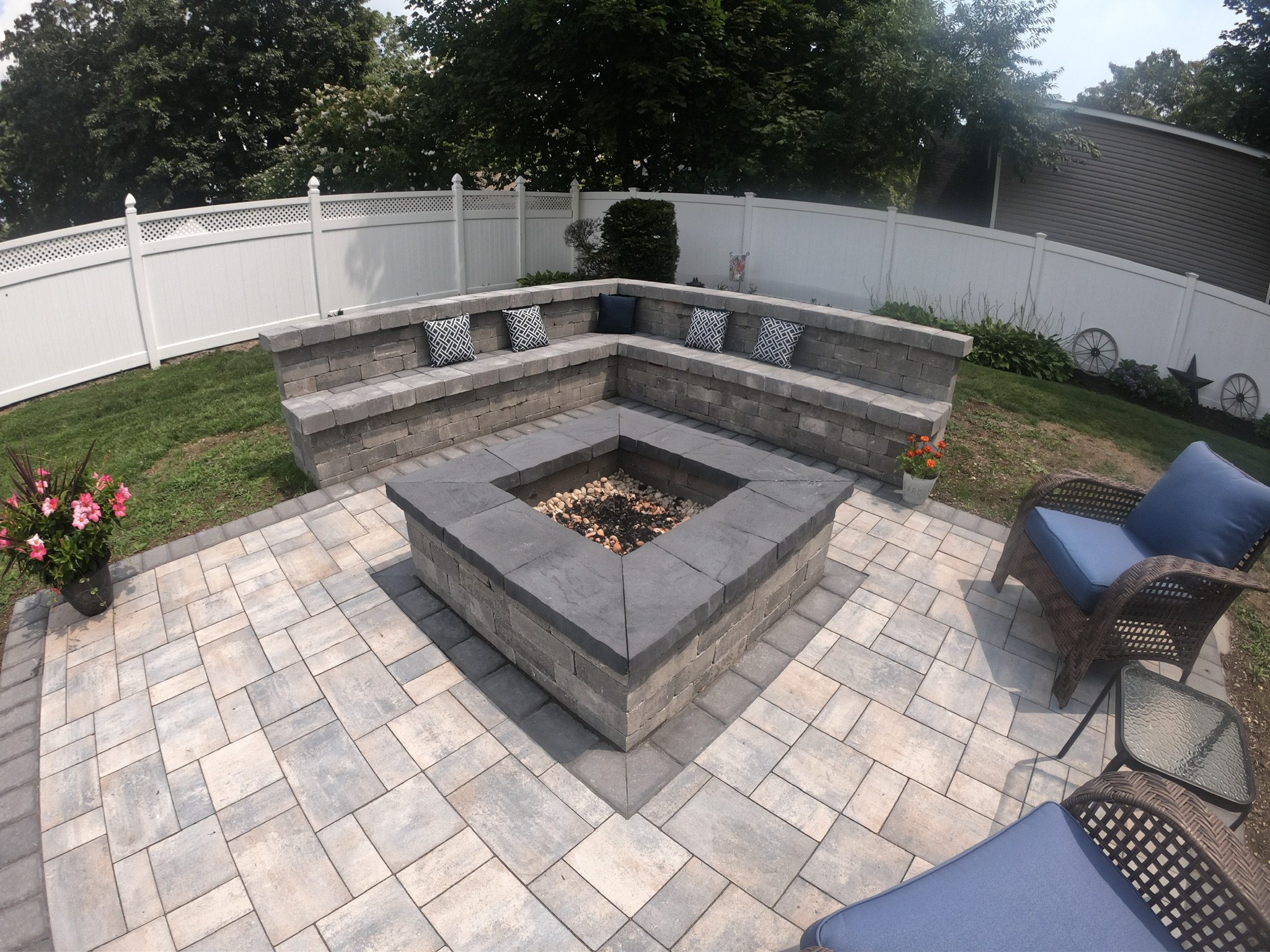 stone fire pit and paver patio area, outdoor living Long Island
